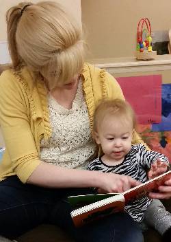 teacher and child reading